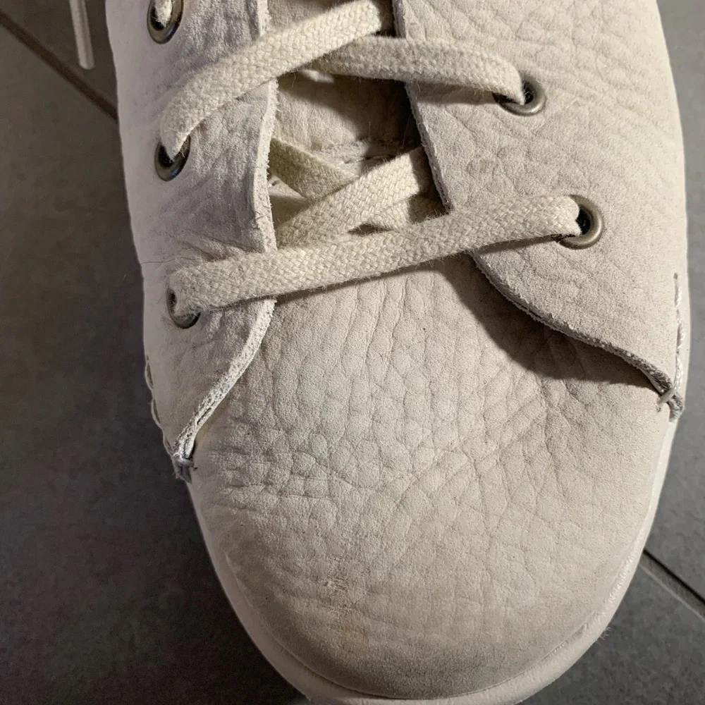 UGG Cream Colored Sneaker Boots